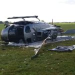 Man fights for life after helicopter crash